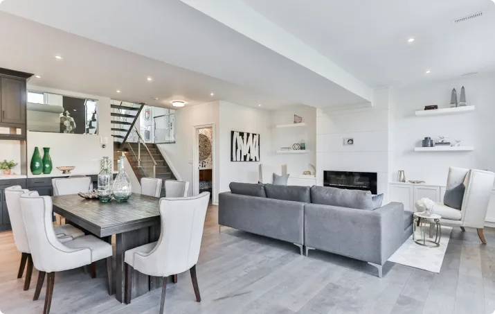 Bright open-plan living and dining room with white walls